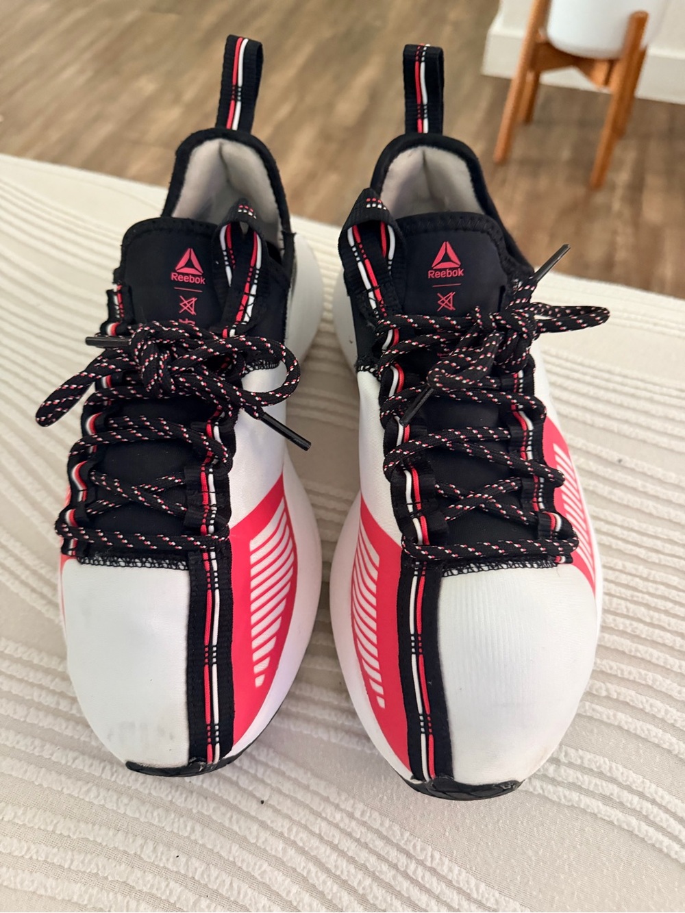 Reebok Ladies White and Black Sneakers with Pink Accents
